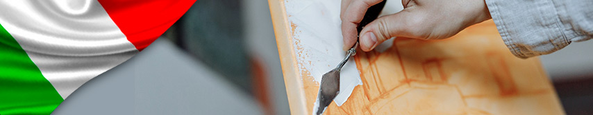 mano de un pintor, aplicando con una pequeña espatula oleo a un lienzo