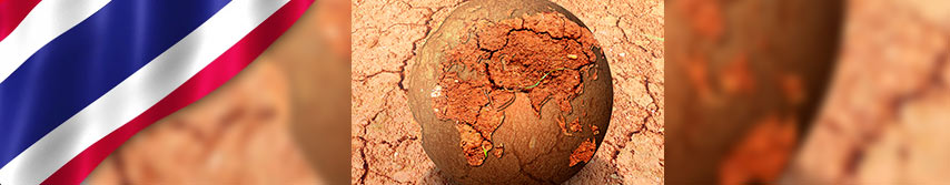 forma del planeta tierra color marrón como esfera artesanal sobre un terreno árido